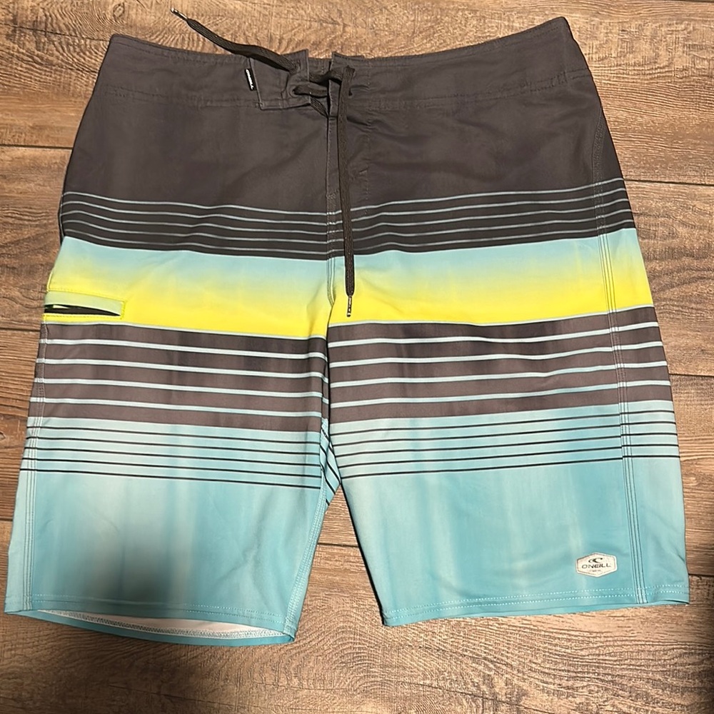 O'Neill Blue and Yellow Board Shorts with Modern Stripes